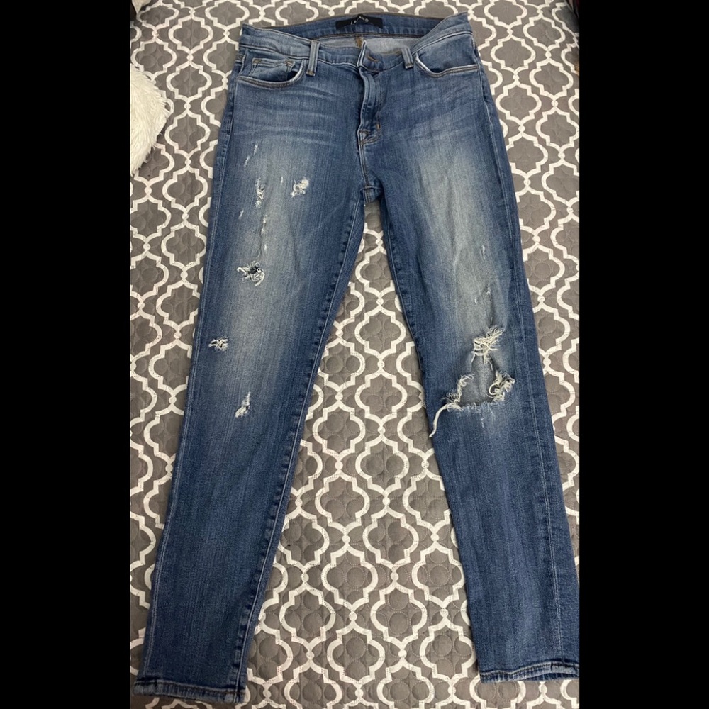 Distressed denim jeans